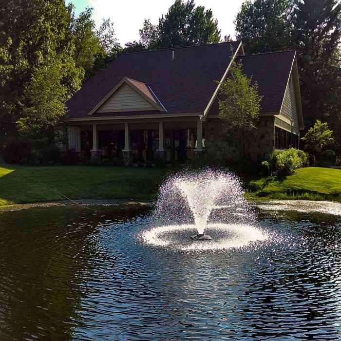 Scott Aerator DA-20 Display Fountain Aerator 1/3HP at the Pond with a House Background