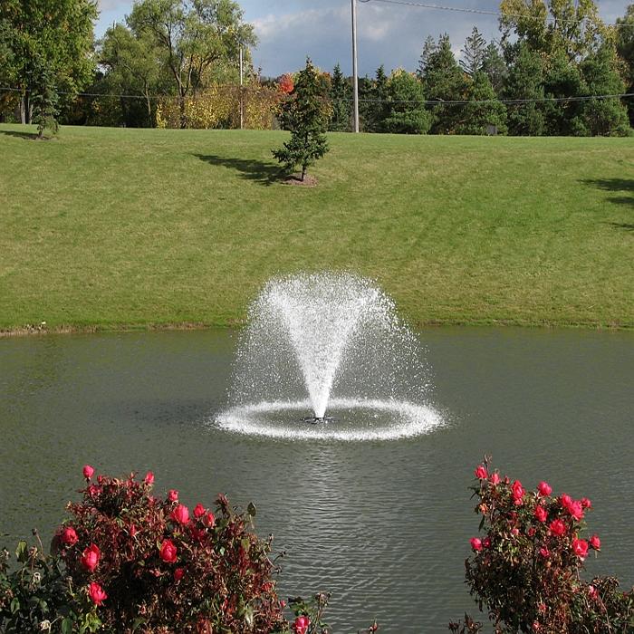 Scott Aerator North Star Fountain Aerator 2HP 230V with Green Grasses Everywhere and Trees