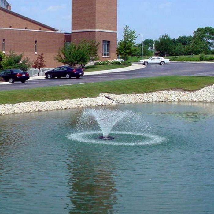 Kasco 4400HVFX 1HP 240V Pond Aerator Fountain with Cars and a Cemented Road Background