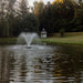 Image of the Scott Aerator DA-20 Display Fountain Aerator 1HP 230V Shooting Water at the Pond with Gazebo and Tress