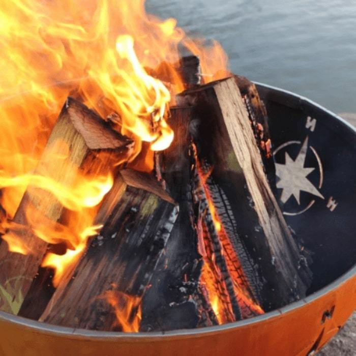 Navigator 36" Steel Fire Pit by Fire Pit Art with Firewoods Burning