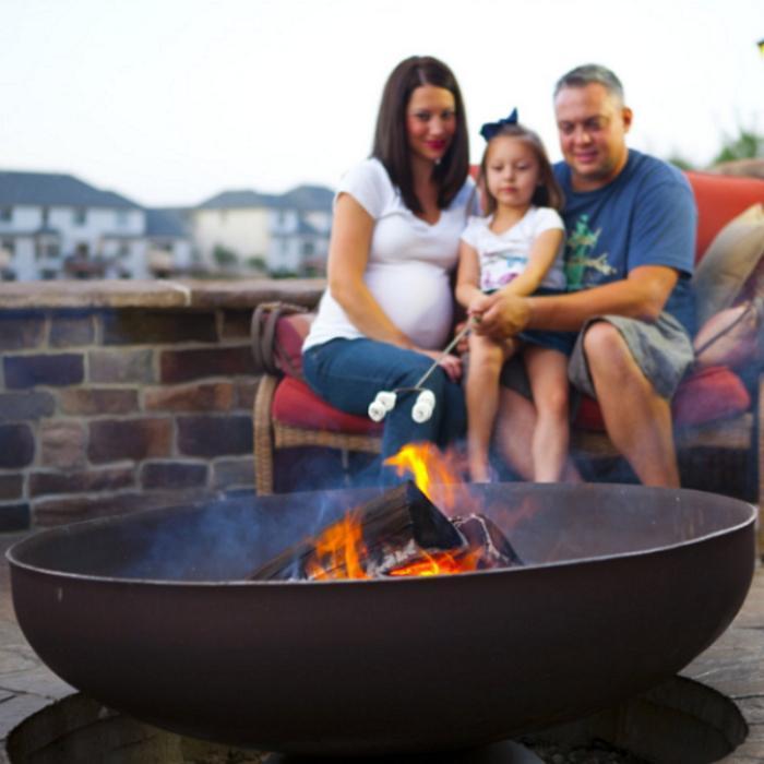 Ohio Flame Patriot Fire Pit with a Family of Three as a Background